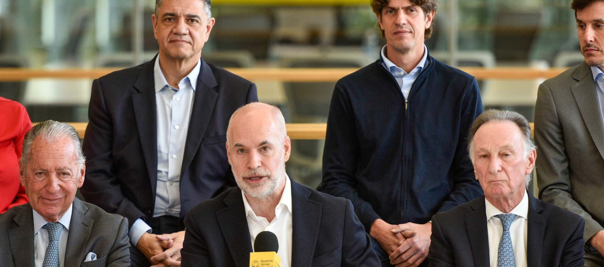 Jorge Macri y Martín Lousteau en un acto porteño.