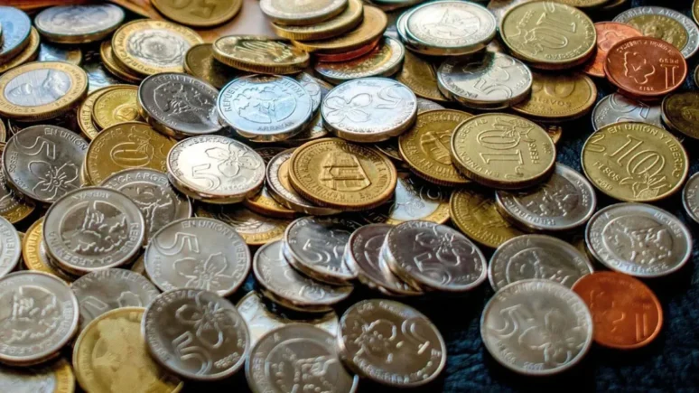 moneda $1